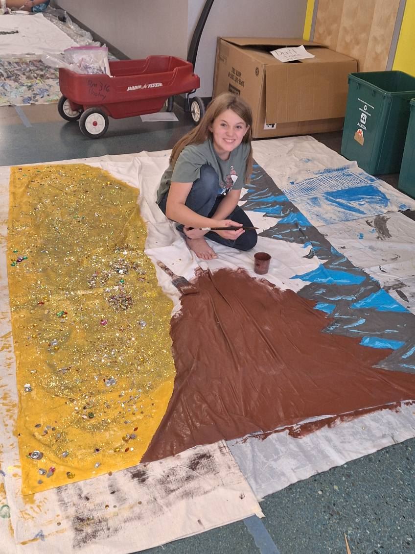 Odyssey students working on background