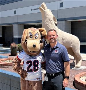 Mr. Hollabaugh and Clyde the Coyote