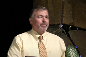 Val Barrett speaks after winning award