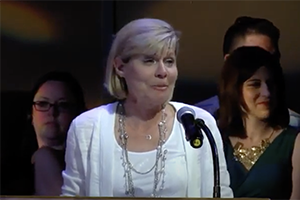 Julie Carlson speaks after winning award