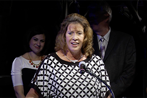 Marla Hobbs speaking at event