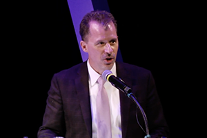 Robert Panzer accepting award at podium